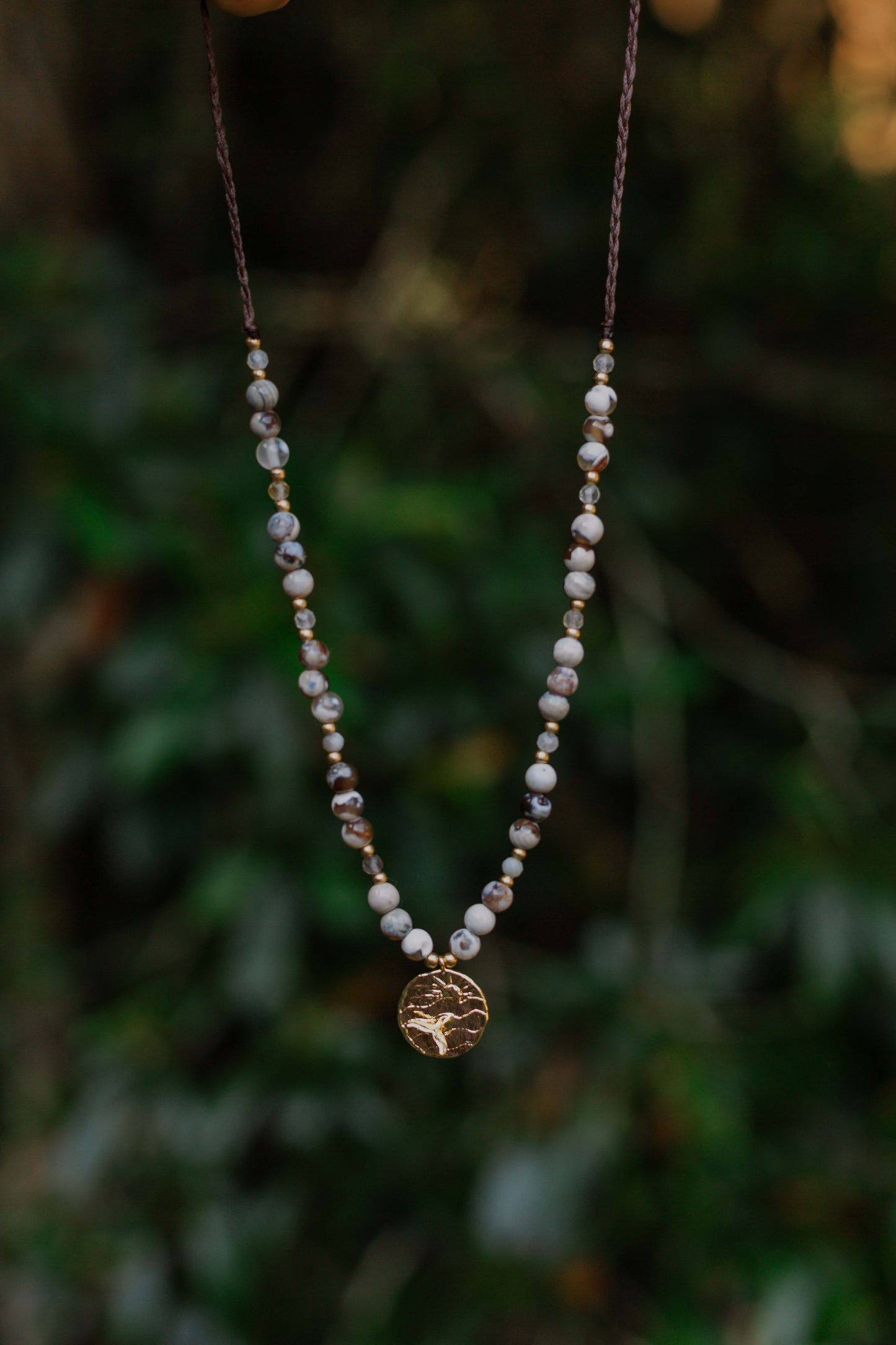 Orca agate and gold plated whale tail necklace