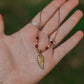 Dainty faceted mookaite and brass leaf necklace