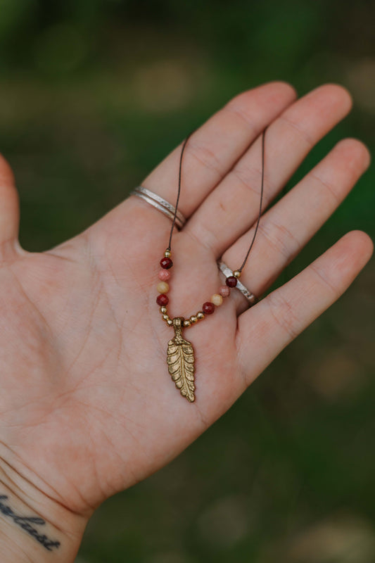 Dainty faceted mookaite and brass leaf necklace