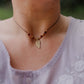 Dainty faceted mookaite and brass leaf necklace