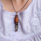 Hand dug Australian smoky quartz and eucalyptus timber pendant