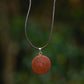 Carved protea seed necklace
