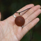 Carved protea seed necklace
